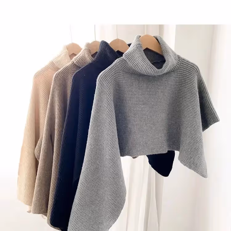 Wholesale Woman Cape Tops Sweater Supplier in Germany